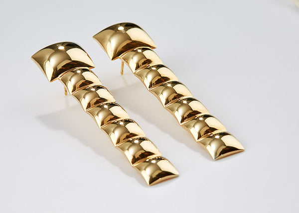 Geometric gold statement earrings